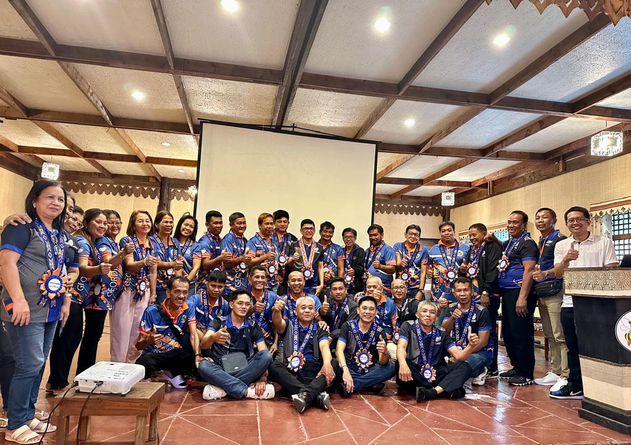 Barangay officials from Gumaca, Quezon Province posing together during their conference at Bohol Bee Farm in Bohol, Philippines.